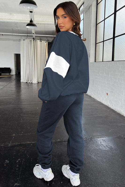 Conjunto deportivo de sudadera y joggers holgados con hombros caídos en azul marino - Bego Fashion