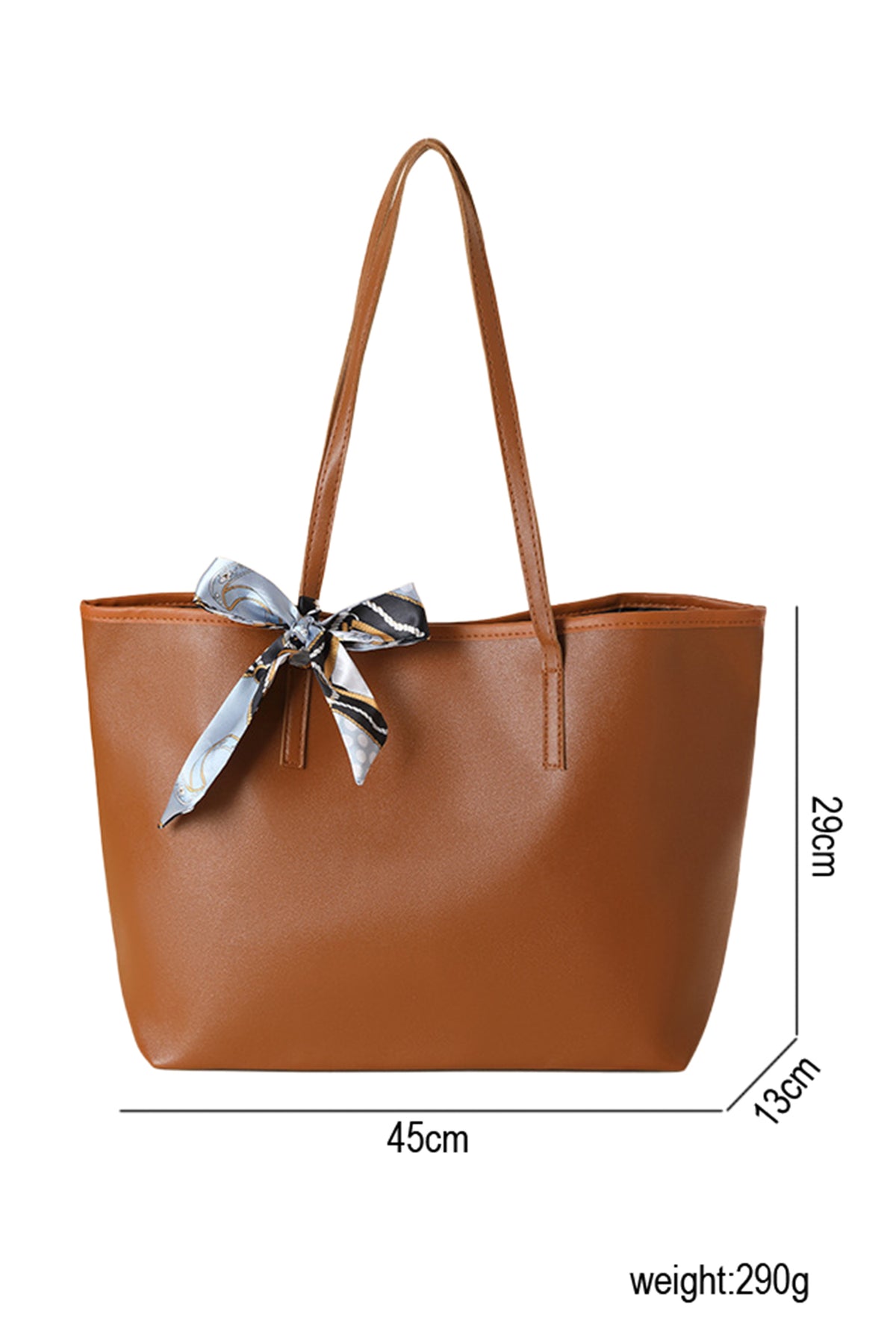 Bolso de piel sintética color castaño, de gran capacidad y con detalle de lazo.