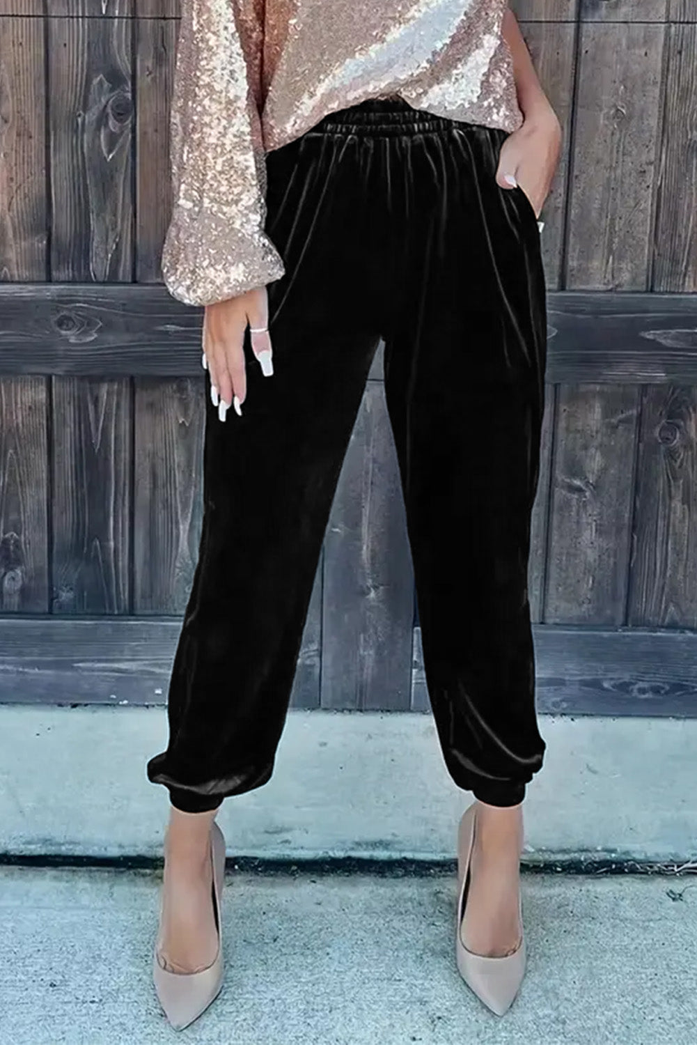 Pantalones tipo jogger de terciopelo negro liso
