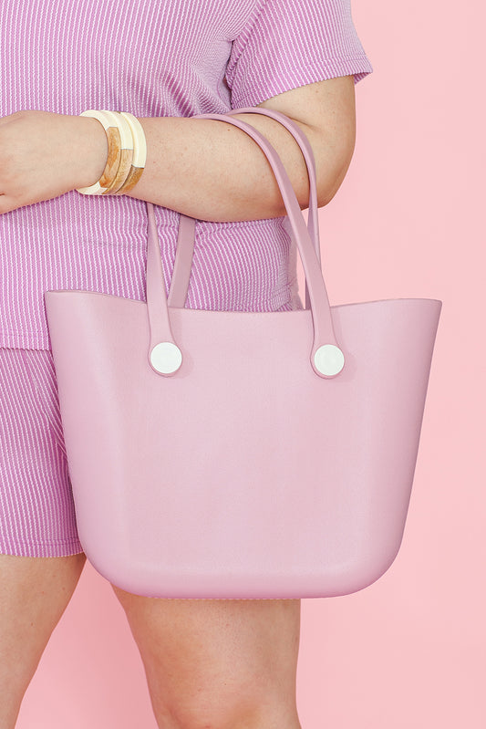 Bolso tipo tote de EVA rosa, impermeable, desmontable y de automontaje.