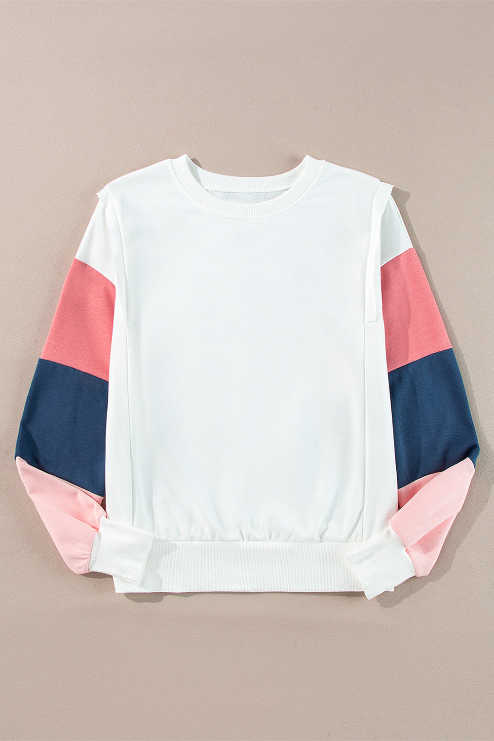 Top de manga larga estilo *color block* en *French Terry* blanco