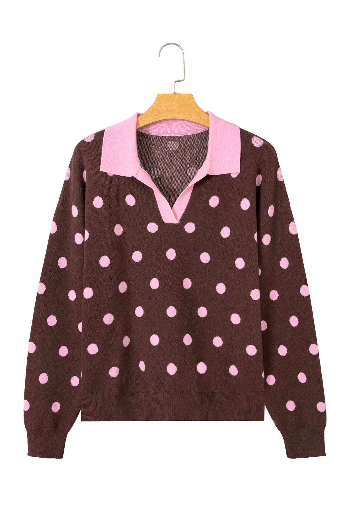 Suéter tipo pulóver holgado con cuello, diseño de bloques de color y estampado de lunares rosas.