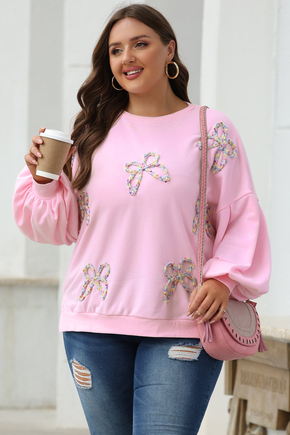 Sudadera extragrande con mangas farol y lazo bordado en rosa claro - Bego Fashion