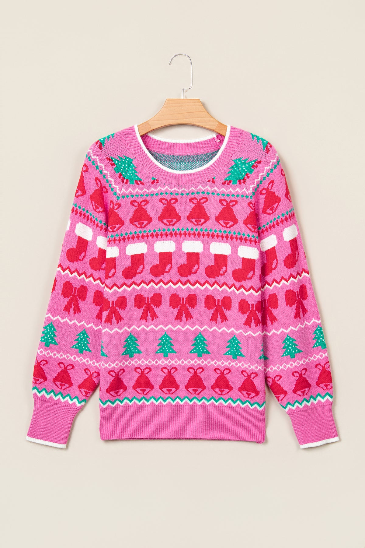 Suéter de punto rosa con cuello redondo y estampado navideño
