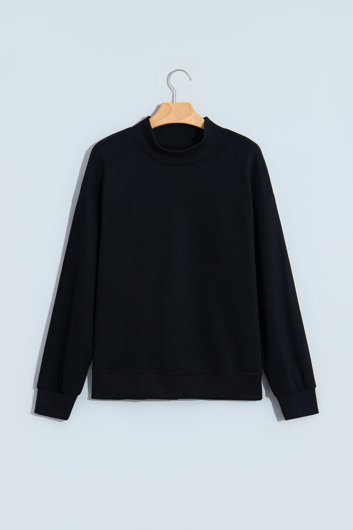 Sudadera negra lisa de corte oversize y cuello perkins