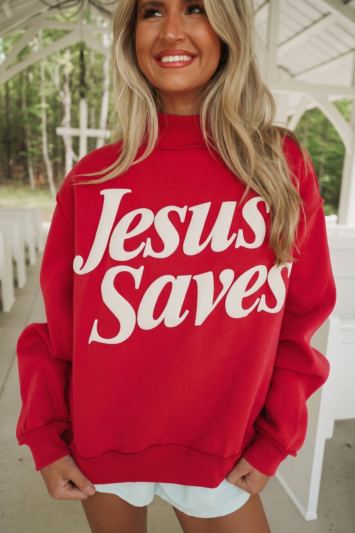 Sudadera holgada de color marrón oscuro con cuello alzado y estampado del eslogan «Jesus Saves»