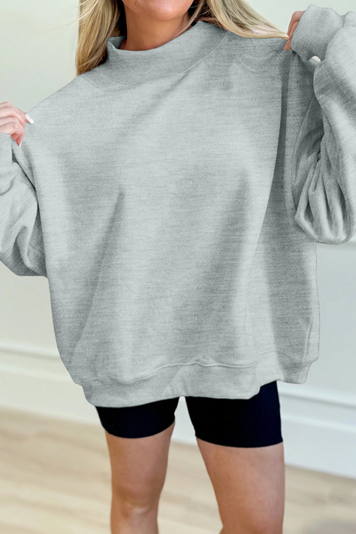 Sudadera negra lisa de corte oversize y cuello perkins