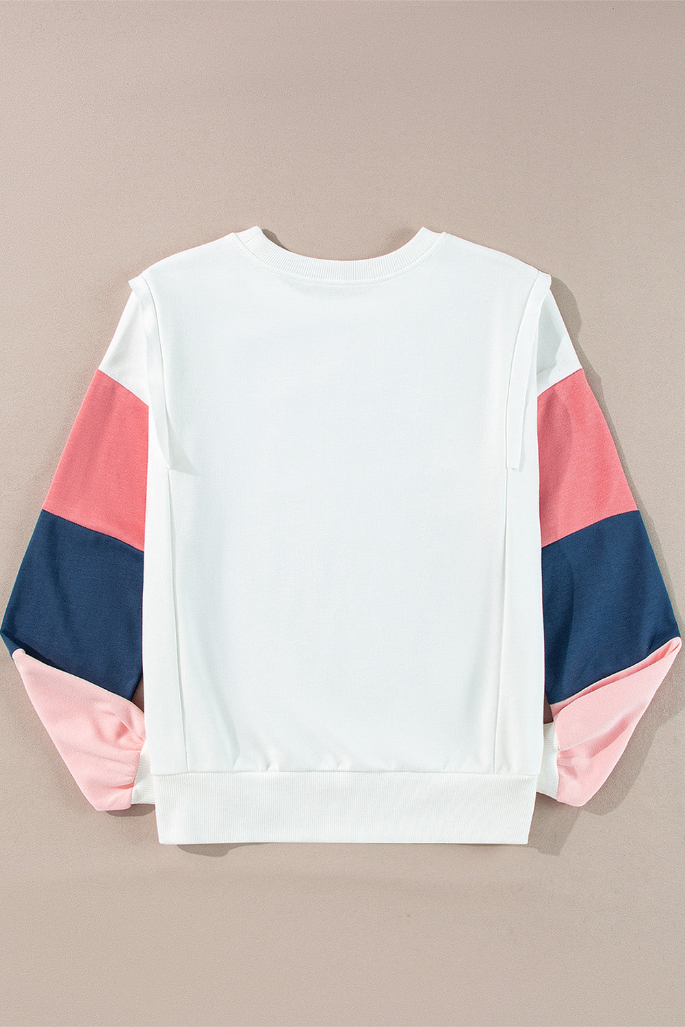Top de manga larga estilo *color block* en *French Terry* blanco