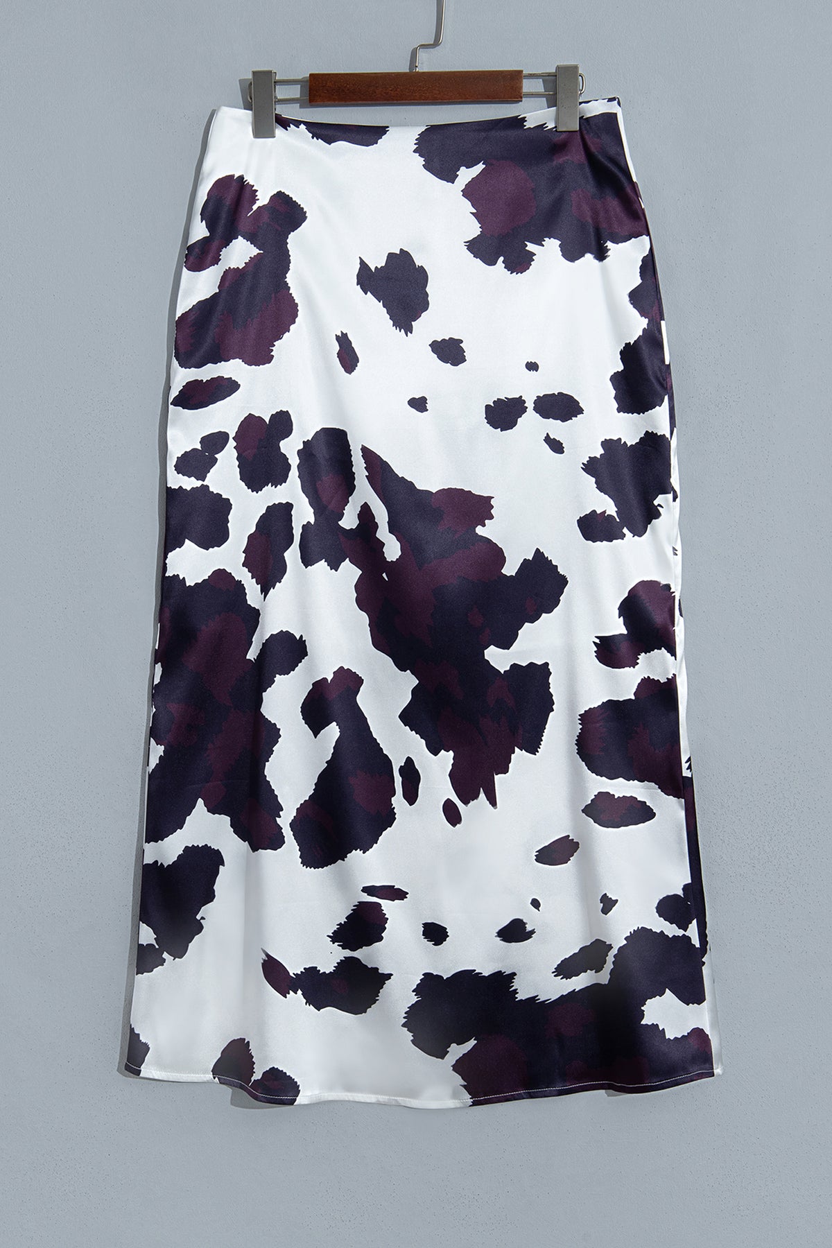 Falda larga estilo western con estampado abstracto marrón y cremallera metálica en la cintura, ideal para uso diario.