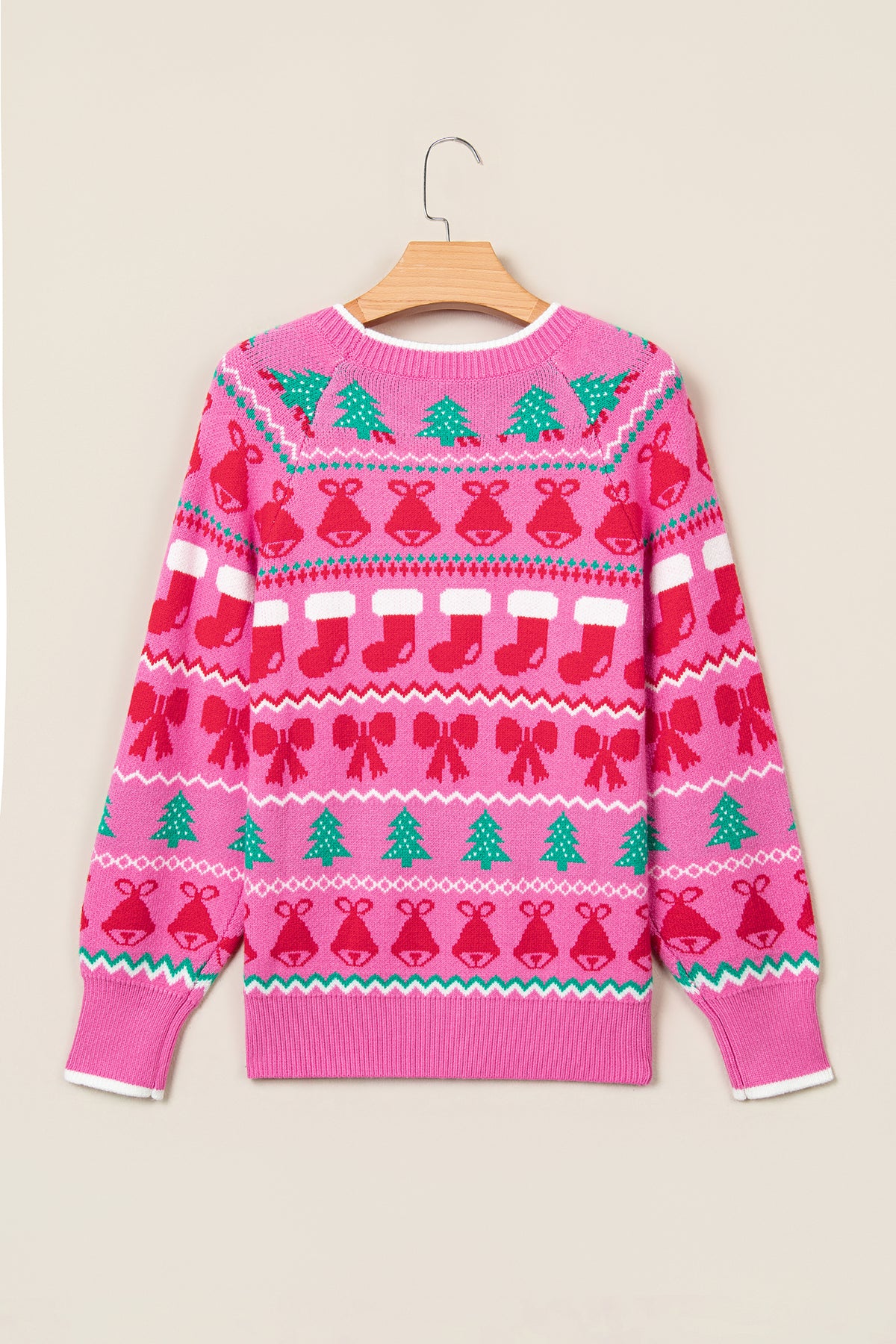 Suéter de punto rosa con cuello redondo y estampado navideño