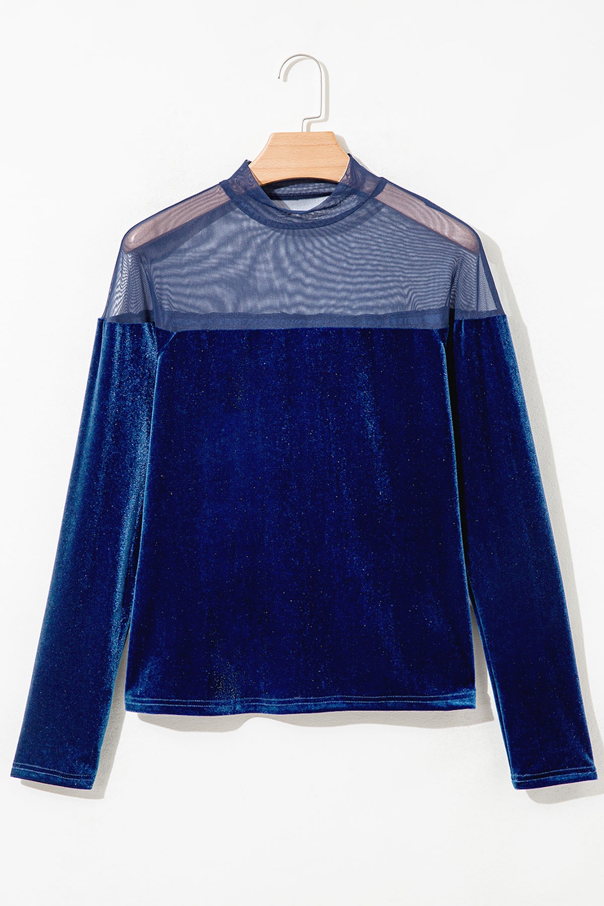 Blusa tipo suéter casual de terciopelo azul marino, de manga larga y estilo patchwork, con cuello transparente.