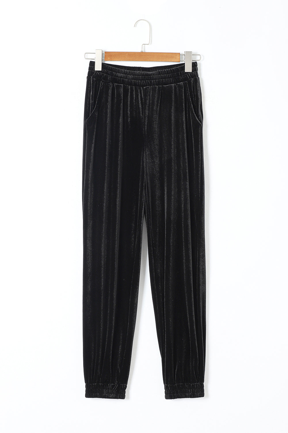 Pantalones tipo jogger de terciopelo negro liso