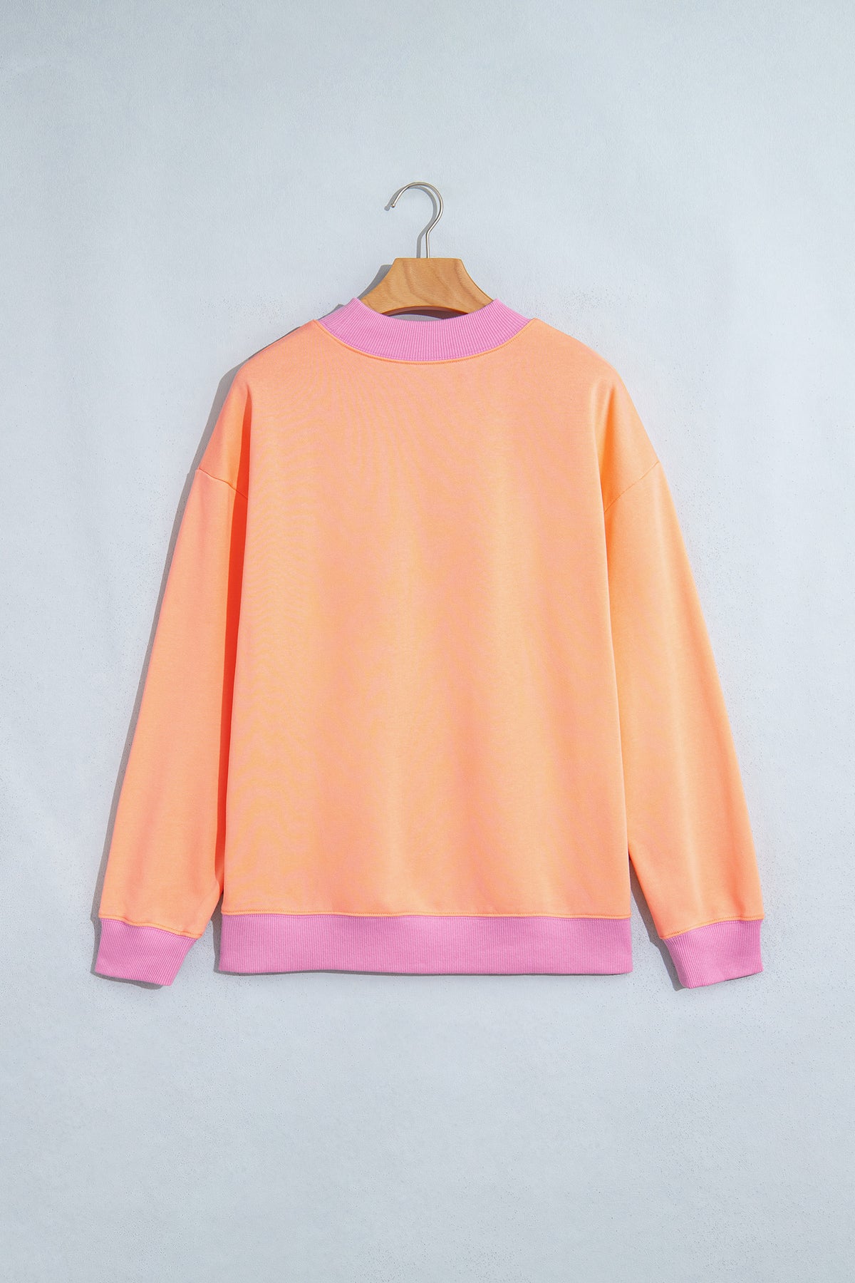 Sudadera de cuello redondo y manga larga en azul sucio con diseño de bloques de color y ribetes