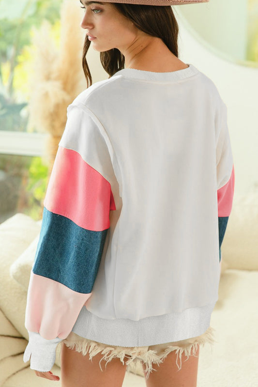 Top de manga larga estilo *color block* en *French Terry* blanco