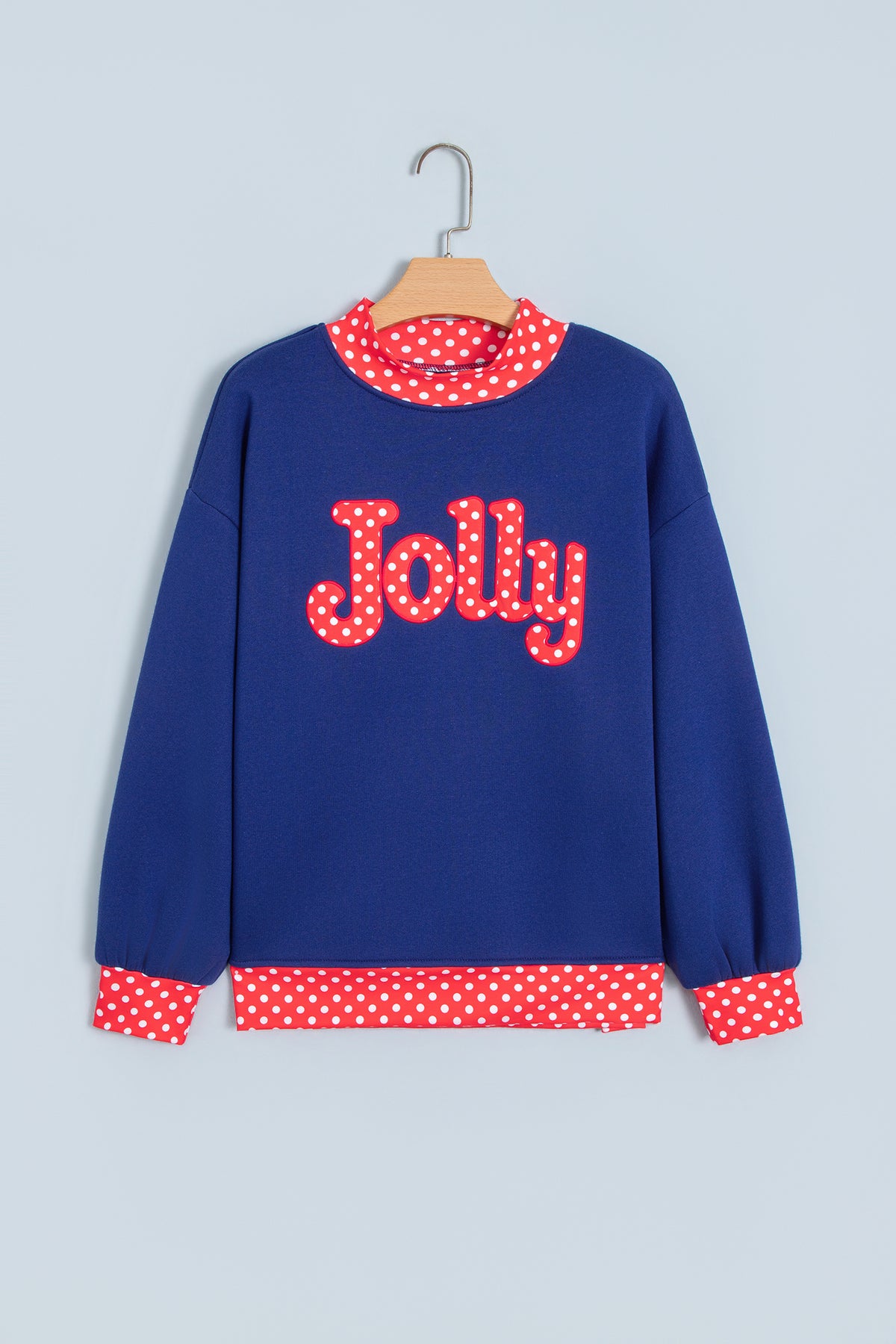 Sudadera rojo intenso con estampado de letras y lunares, cuello perkins y ribetes en contraste