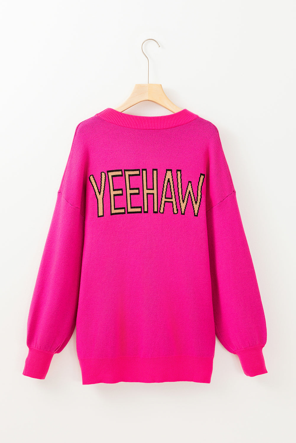 Suéter oversize de color rojo intenso con hombros caídos y diseño de sombrero de vaquero "Yeehaw"